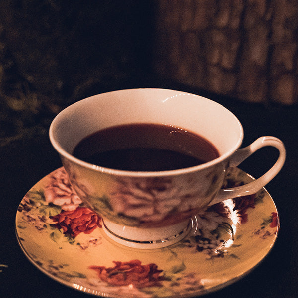 chocolate beverage in fancy china cup